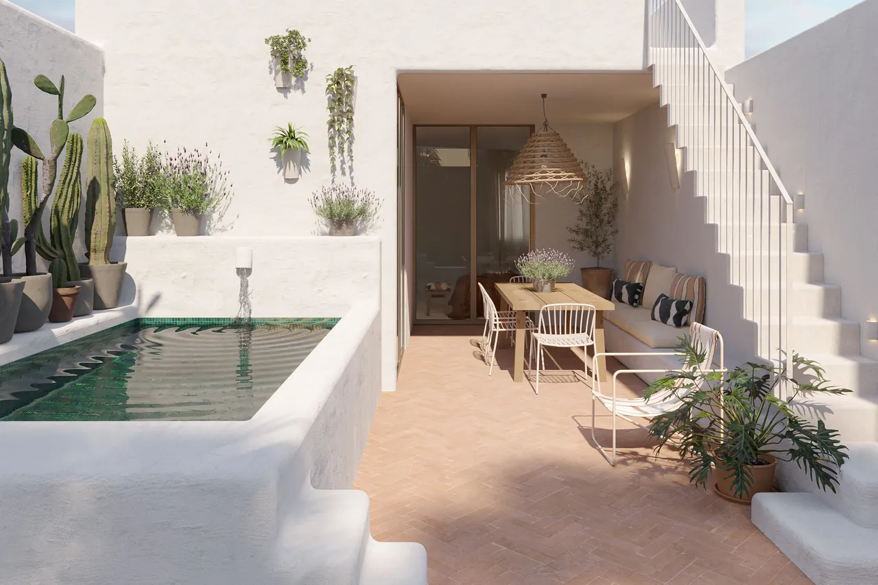 Patio con alberca y escalera encalada